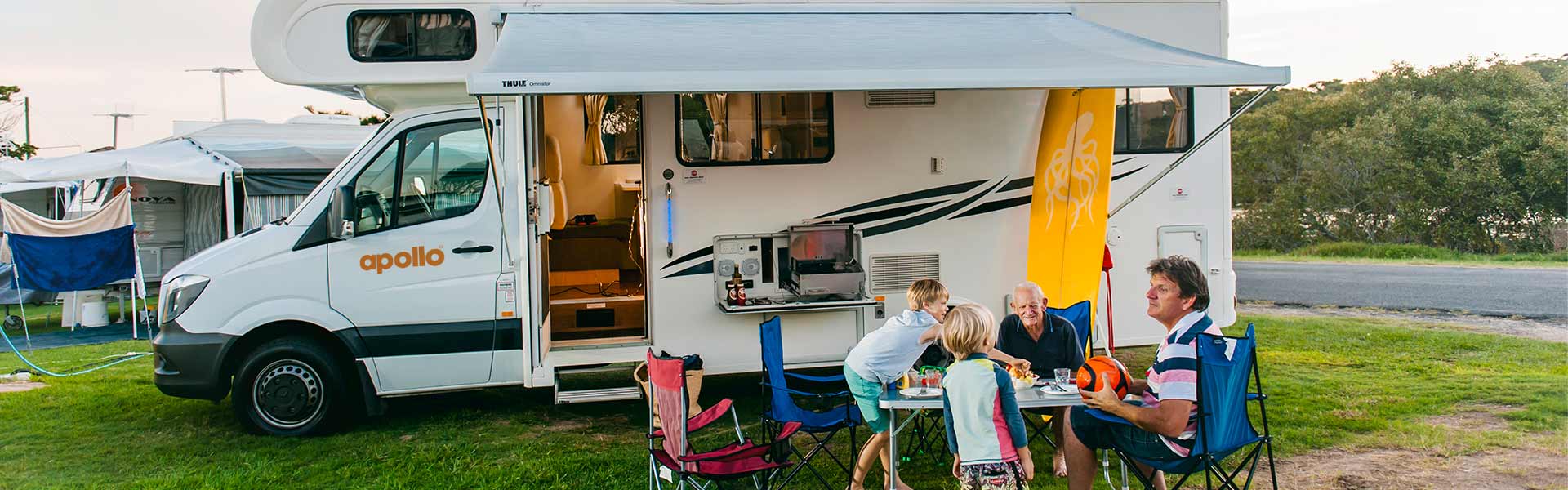 family enjoying their holiday at campervan park